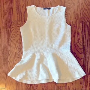 Essentials by Milano | White peplum sleeveless top 🤍